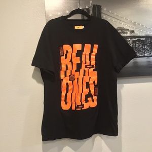 ROKIT Black T-Shirt With Bright Orange Letters Saying “REAL ONES” Size L